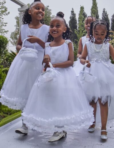 Smiling flower girls.